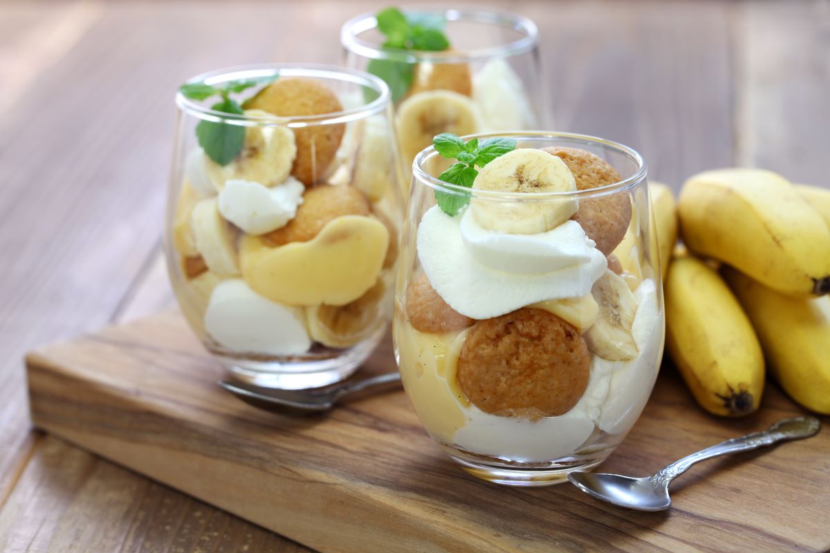 Banana pudding cups for freezin with layers of pudding, vanilla wafers and whipped cream.