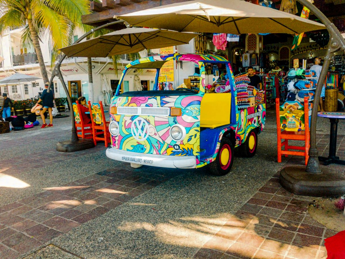 A colorful truck with hats at the boardwalk at the Malecon Puerto Vallarta.