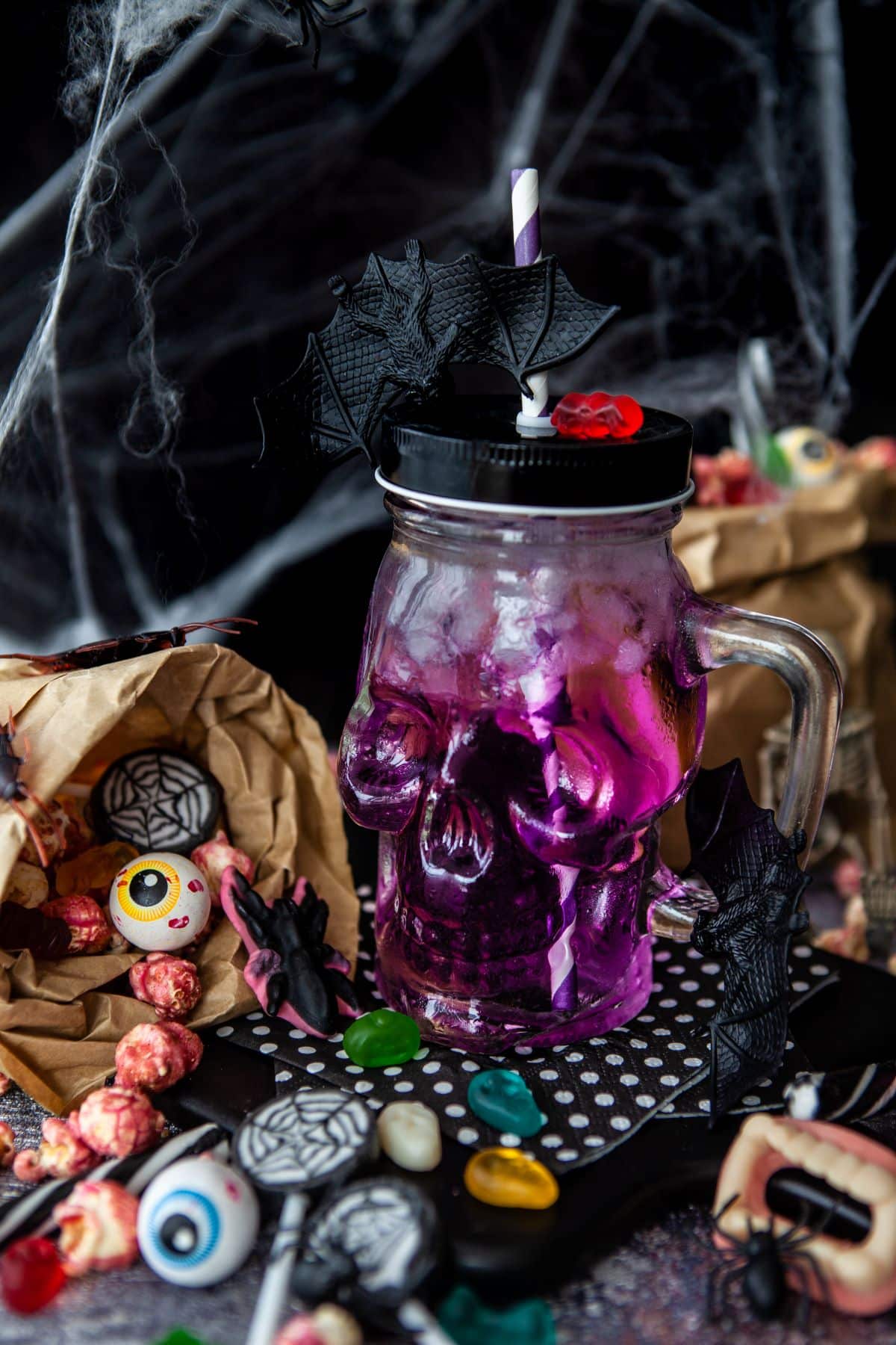 Purple Halloween Cocktail in a halloween mason jar.