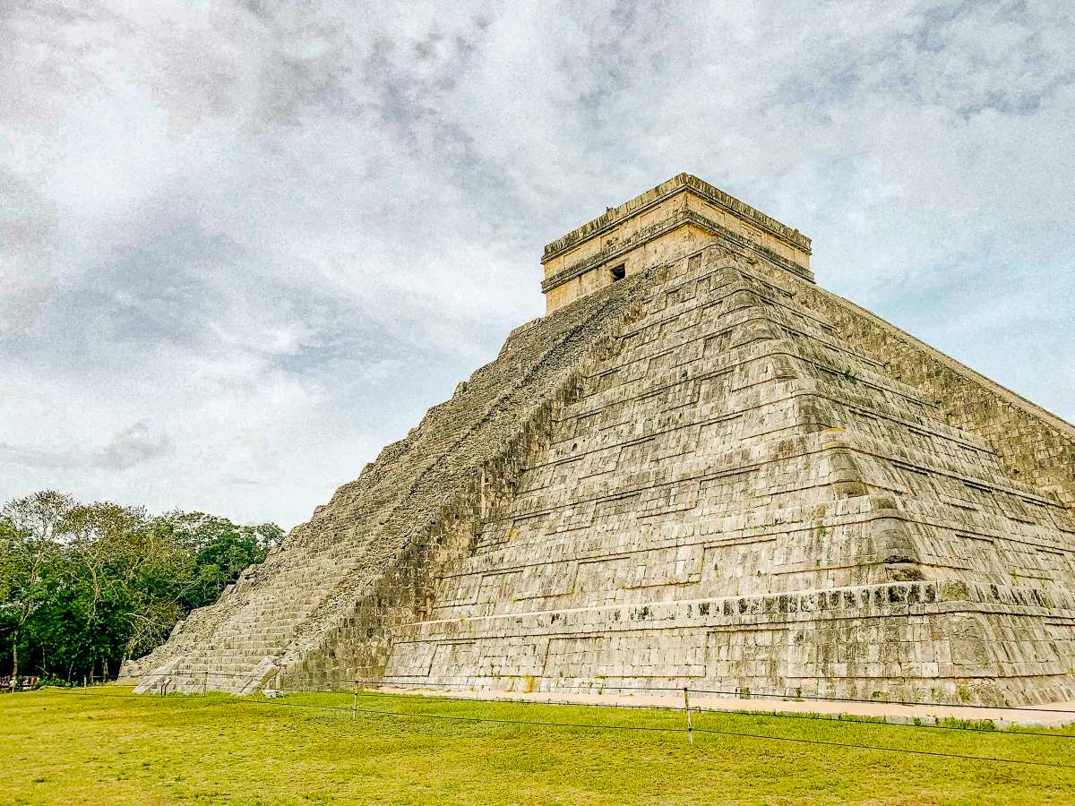 A large rock structure at a Merida to Chichen Itza tour.