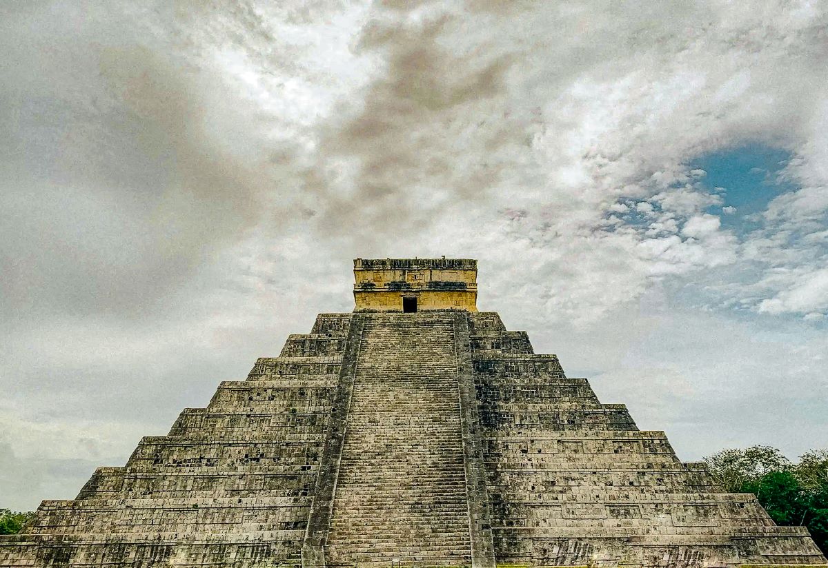 A view of a tall pyramid at Chichen Itza.