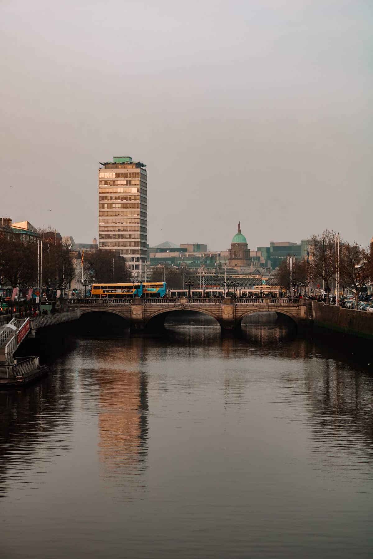 A view of Dublin city buildings and water.