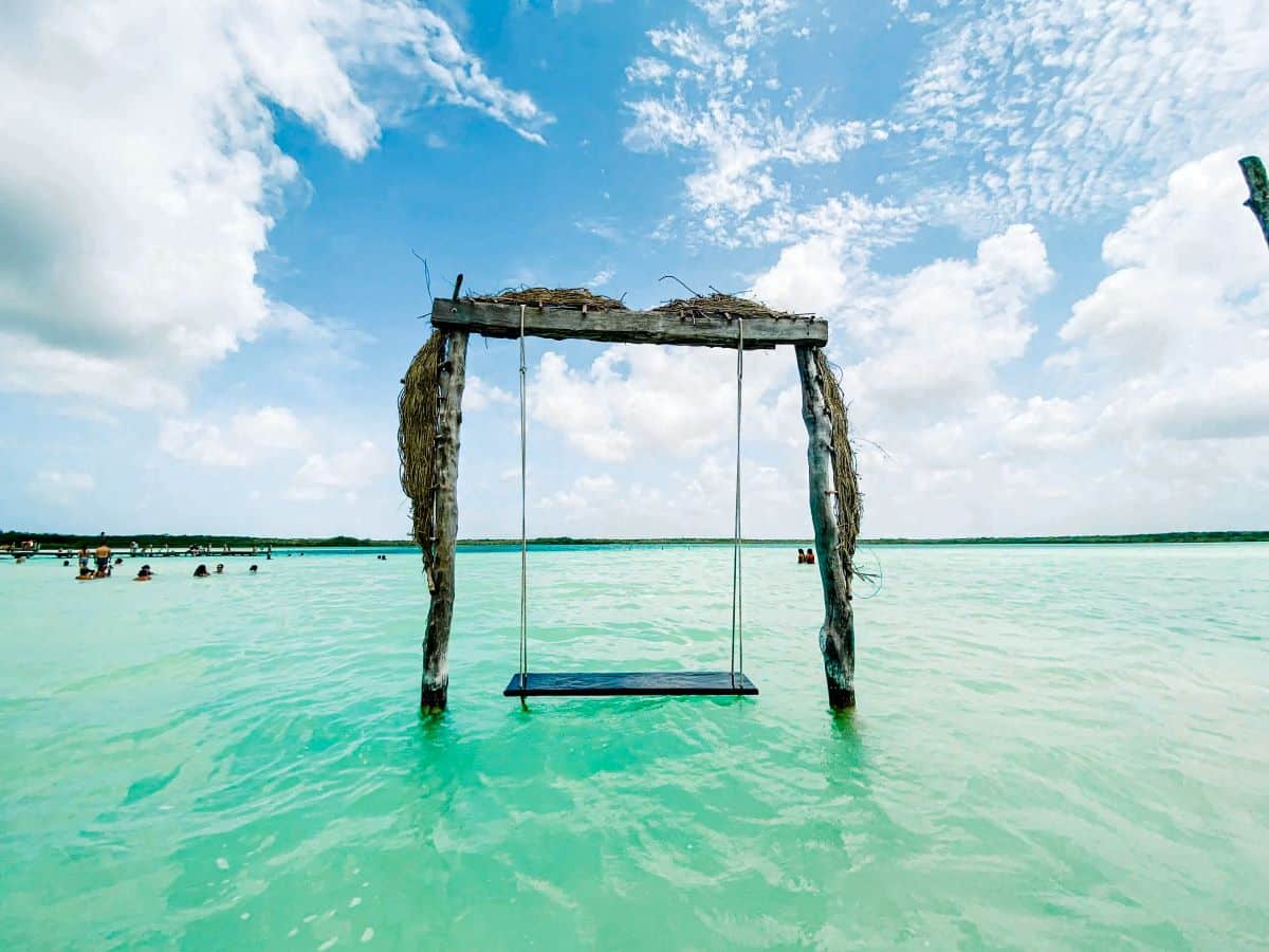 A water swing over beautiful turquoise waters.